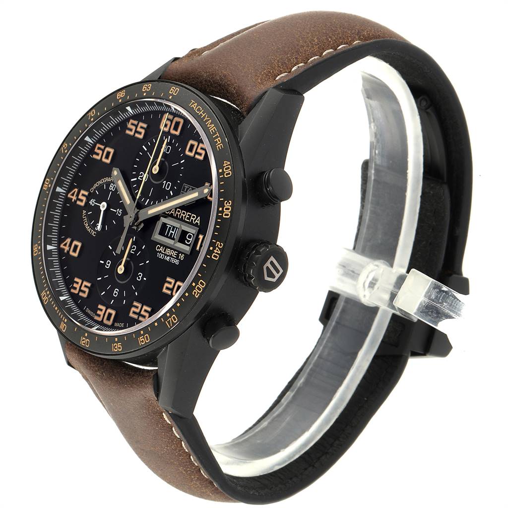 The image shows a side view of a Tag Heuer Carrera CV2A84.FC6394 Men's Titanium Black Dial CV2A84.FC6394 Men's Titanium Black Dial watch highlighting the dial, bezel, crown, and brown leather strap.