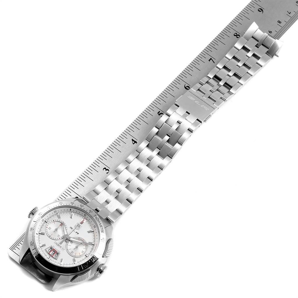 The image shows the Tag Heuer SLR CAG2011.BA0254 Men's Stainless Steel Silver Dial CAG2011.BA0254 Men's Stainless Steel Silver Dial watch laid flat with a ruler measuring its length.