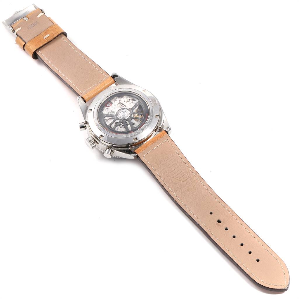 This image shows the back view of the Tag Heuer Autavia CBE2110.FC8226 Men's Stainless Steel Black Dial CBE2110.FC8226 Men's Stainless Steel Black Dial watch, showcasing its leather strap and visible movement through the case back.