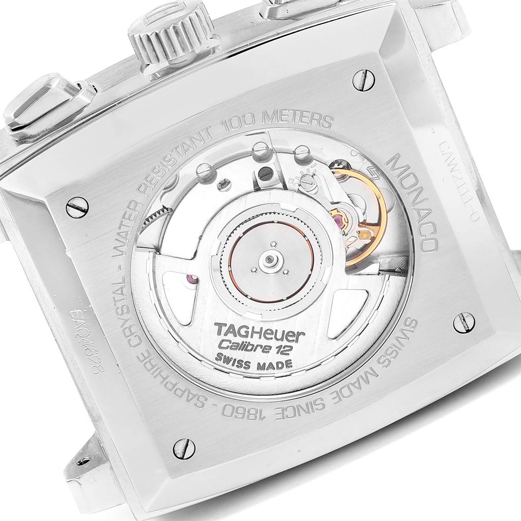 This image shows the back casing and movement of a Tag Heuer Monaco CAW2111 Men's Stainless Steel Blue Dial CAW2111 Men's Stainless Steel Blue Dial watch, highlighting the Calibre 12 mechanism.