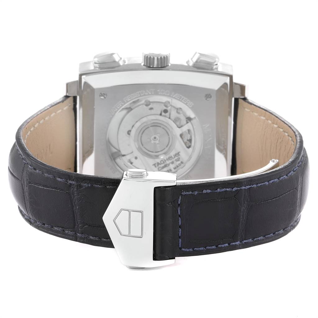 The image shows the back view of the Tag Heuer Monaco CAW2111 Men's Stainless Steel Blue Dial CAW2111 Men's Stainless Steel Blue Dial watch, highlighting the case back and leather strap with a clasp.