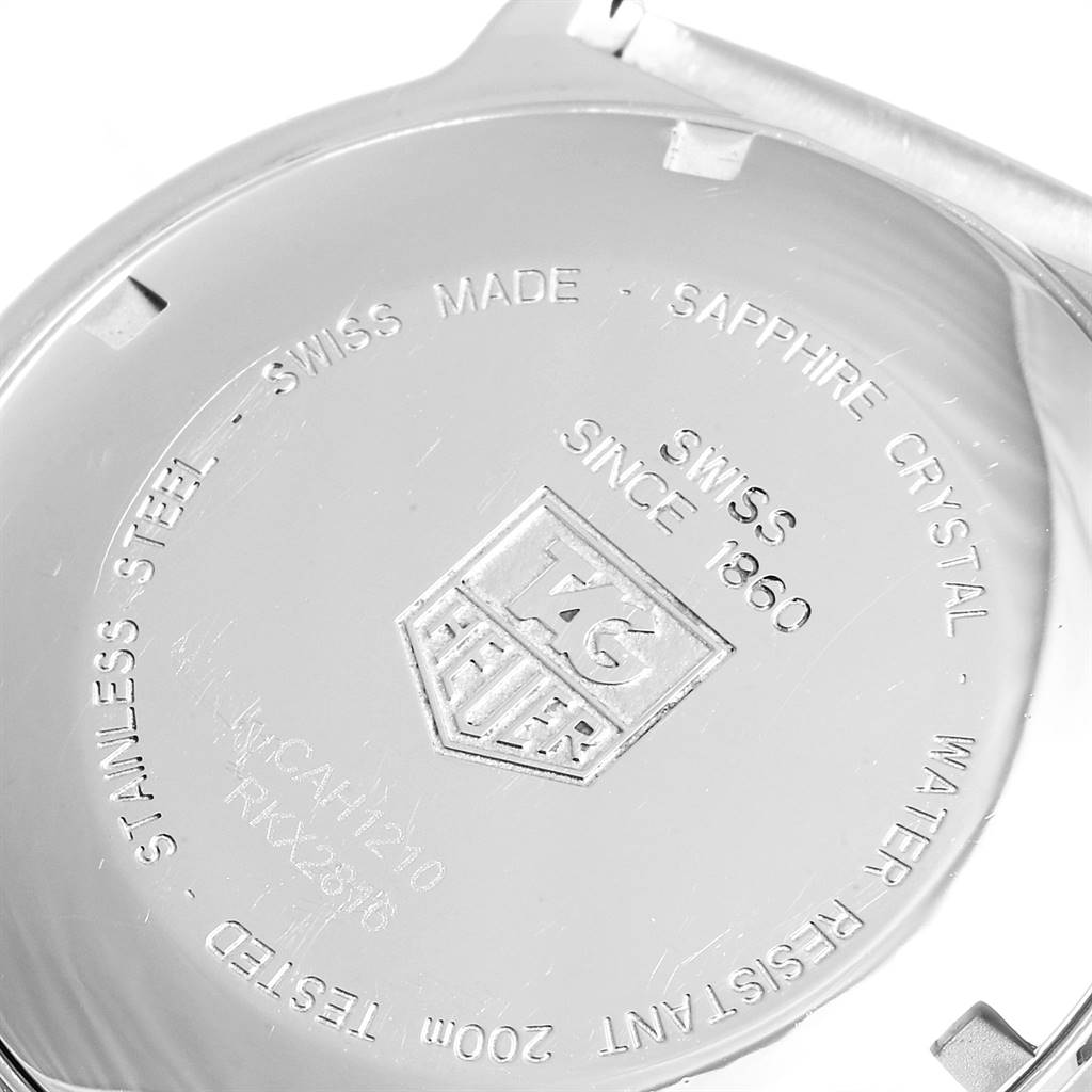 The image shows the back case of a Tag Heuer Formula 1 CAH1210.BA0862 Men's Stainless Steel Black Dial CAH1210.BA0862 Men's Stainless Steel Black Dial watch, highlighting inscriptions and the brand logo.