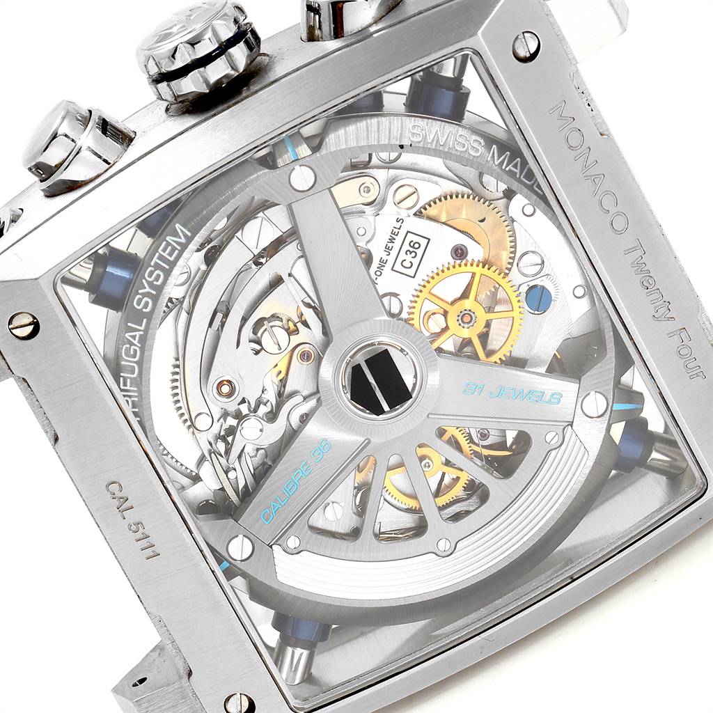 The image shows the back view of the Tag Heuer Monaco CAL5111.FC6299 Men's Stainless Steel Blue Dial CAL5111.FC6299 Men's Stainless Steel Blue Dial watch, revealing its intricate movement and internal mechanisms.
