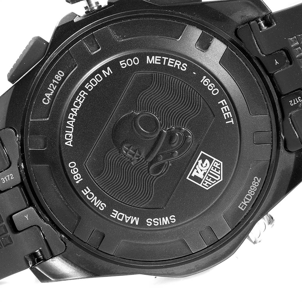 This image shows the back case of a Tag Heuer Aquaracer CAJ2180.FT6023 Men's Titanium Black Dial CAJ2180.FT6023 Men's Titanium Black Dial watch, focusing on its model number, water resistance, and branding.