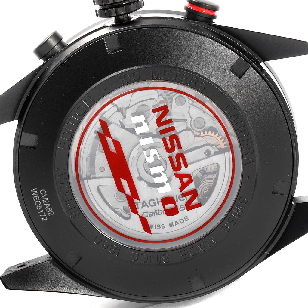 The image shows the back case of a Tag Heuer Carrera CV2A82.FC6237 Men's Titanium Black Dial CV2A82.FC6237 Men's Titanium Black Dial watch, displaying the internal mechanism and "Nissan Nismo" branding.