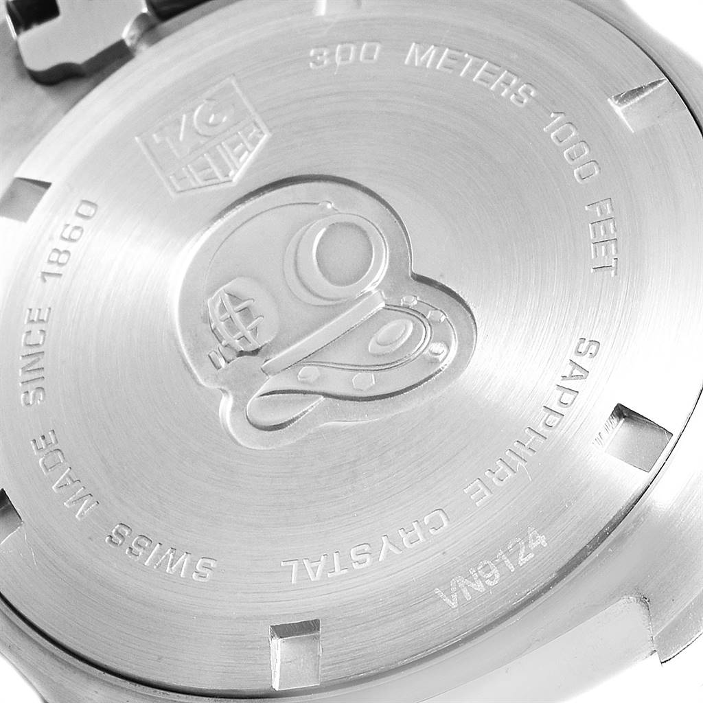 The image shows the back case of a Tag Heuer Aquaracer WAF1110.BA0800 Men's Stainless Steel Black Dial WAF1110.BA0800 Men's Stainless Steel Black Dial watch, displaying its engravings and design.