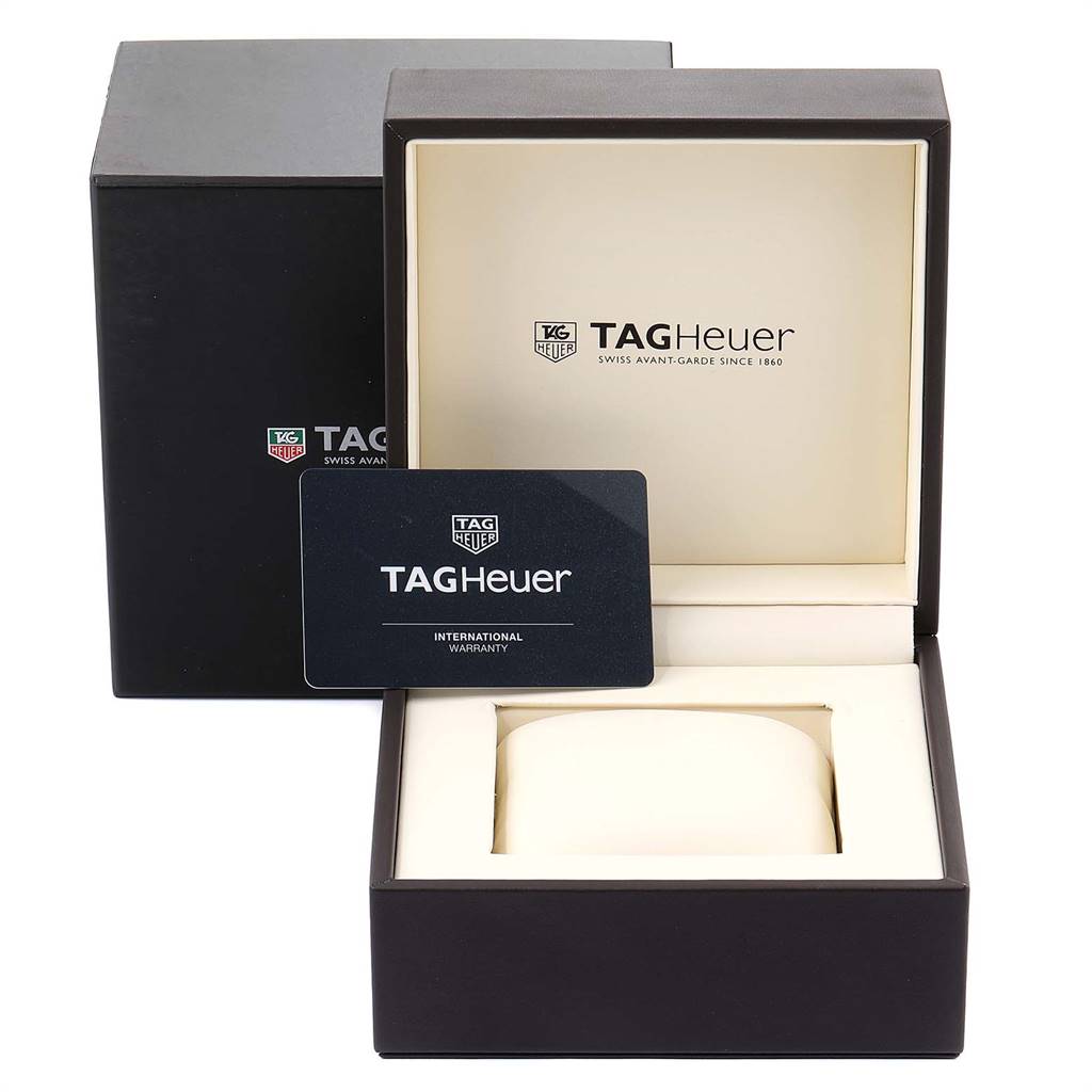 The image shows the packaging for a Tag Heuer Carrera CAR2A91.BH0742 Men's Stainless Steel Black Dial CAR2A91.BH0742 Men's Stainless Steel Black Dial model watch, including an international warranty card and an open watch box.