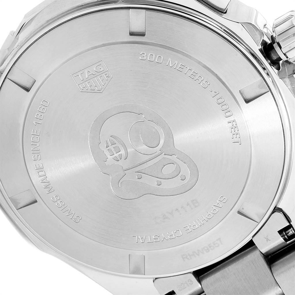 This image shows the case back of a Tag Heuer Aquaracer CAY111B.BA0927 Men
s Stainless Steel Blue Dial CAY111B.BA0927 Men
s Stainless Steel Blue Dial watch, highlighting its 300-meter water resistance and engraved design.