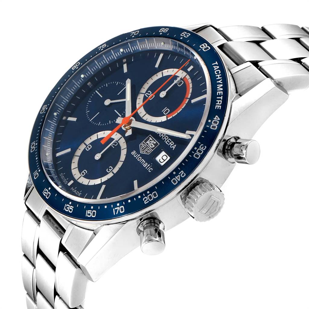The image shows a side-angle view of the Tag Heuer Carrera CV2A1V.BA0738 Men's Stainless Steel Blue Dial CV2A1V.BA0738 Men's Stainless Steel Blue Dial watch, highlighting its blue dial, tachymeter bezel, crown, and chronograph pushers.