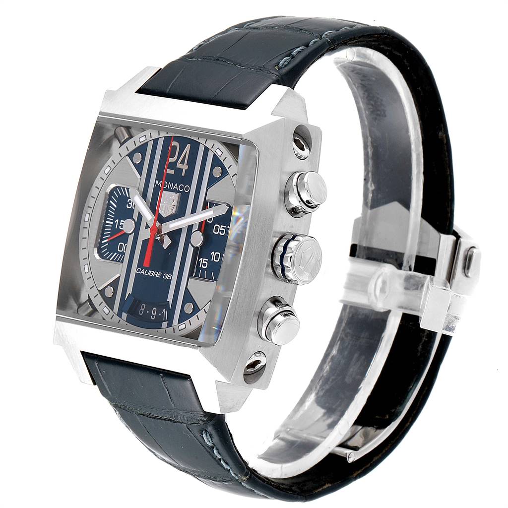 The image shows a Tag Heuer Monaco CAL5111.FC6299 Men's Stainless Steel Blue Dial CAL5111.FC6299 Men's Stainless Steel Blue Dial watch from a side angle, highlighting the face, strap, and adjustment knobs.