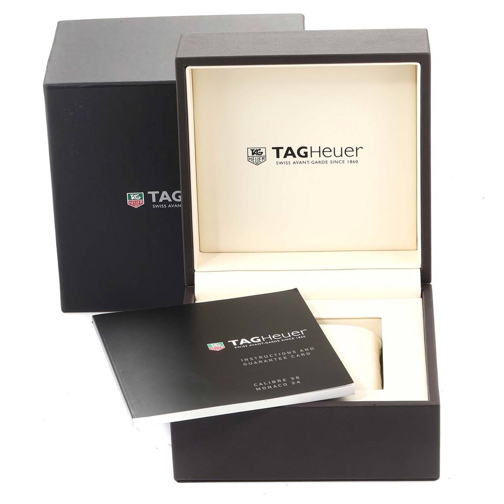 The image shows the open box, pillow, and instruction booklet for the Tag Heuer Monaco CAL5111.FC6299 Men's Stainless Steel Blue Dial CAL5111.FC6299 Men's Stainless Steel Blue Dial model watch.