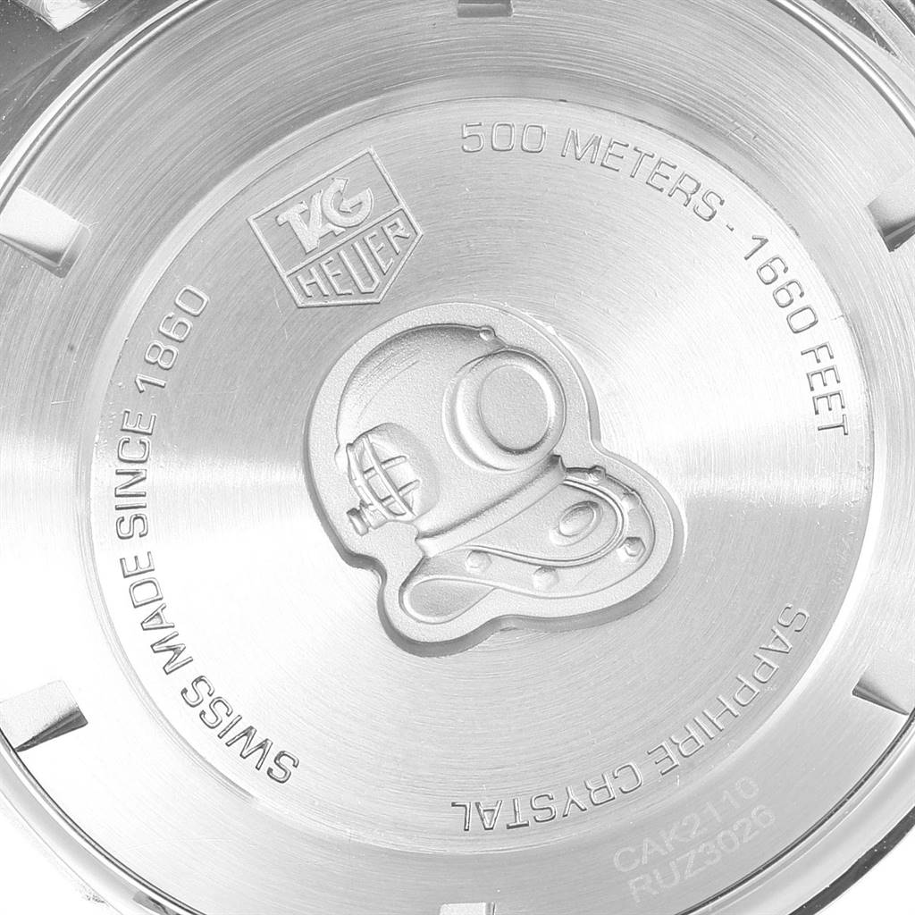 This image shows the back case of a Tag Heuer Aquaracer CAK2110.BA0833 Men's Stainless Steel Black Dial CAK2110.BA0833 Men's Stainless Steel Black Dial watch, highlighting the brand logo, water resistance, and specific engravings.