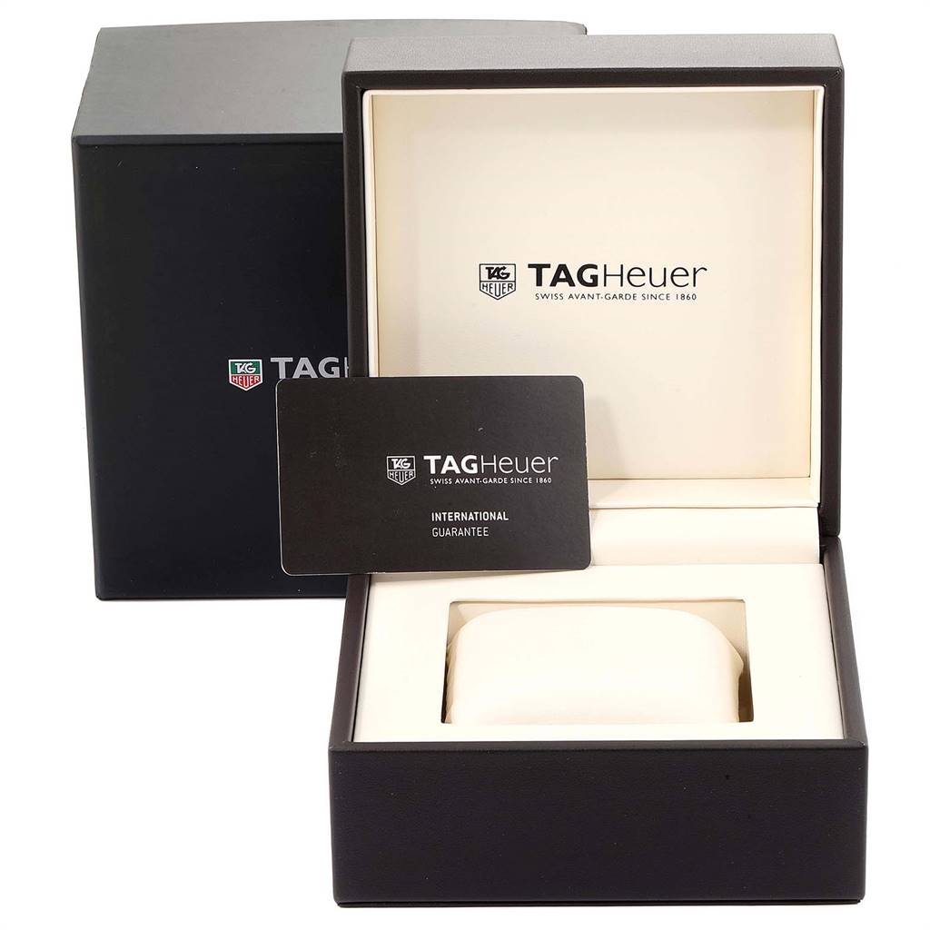 This image shows the packaging box and international guarantee card for the Tag Heuer Aquaracer CAK2110.BA0833 Men's Stainless Steel Black Dial CAK2110.BA0833 Men's Stainless Steel Black Dial watch.