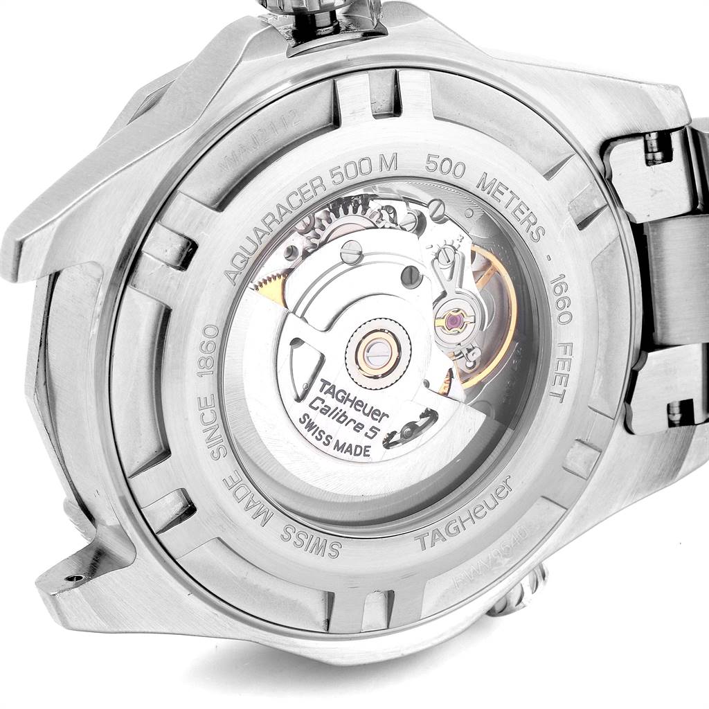 The image shows the back view of a Tag Heuer Aquaracer RWV9540 Men
s Stainless Steel Blue Dial RWV9540 Men
s Stainless Steel Blue Dial watch, highlighting its Calibre 5 automatic movement and case details.