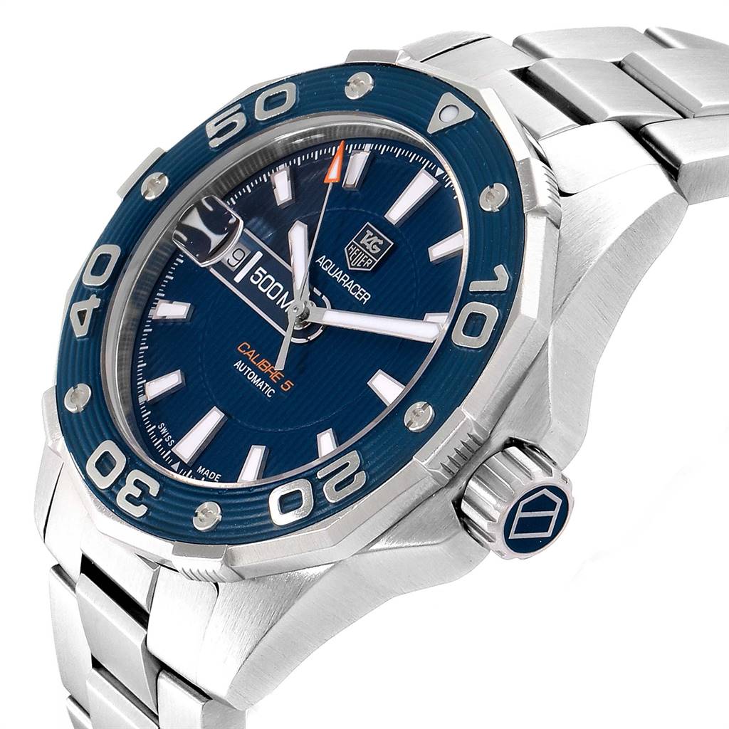 This image shows a Tag Heuer Aquaracer RWV9540 Men
s Stainless Steel Blue Dial RWV9540 Men
s Stainless Steel Blue Dial watch at an angled close-up, displaying the bezel, dial, crown, and part of the bracelet.