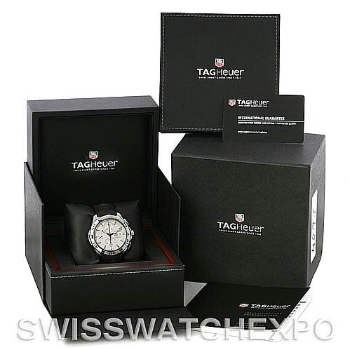 The image shows a Tag Heuer Aquaracer CAP2111.FT6028 Men's Stainless Steel Silver Dial CAP2111.FT6028 Men's Stainless Steel Silver Dial watch in its box, alongside the outer packaging, warranty card, and manual.