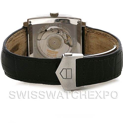 The image shows the back view of a Tag Heuer Monaco WW2110 Men's Stainless Steel Black Dial WW2110 Men's Stainless Steel Black Dial watch, highlighting the automatic movement and black leather strap with a clasp.