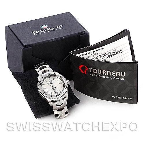 The image shows a Tag Heuer Link WW2110 Men's Stainless Steel Silver Dial WW2110 Men's Stainless Steel Silver Dial watch with its box, warranty card, and certificate of origin from an angled top view.
