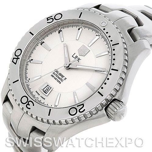 The image shows a Tag Heuer Link WW2110 Men's Stainless Steel Silver Dial WW2110 Men's Stainless Steel Silver Dial model watch from a side angle, highlighting its bezel, crown, dial, and part of the bracelet.