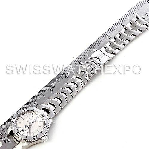 The image shows the band and bezel of a Tag Heuer Link WW2110 Men's Stainless Steel Silver Dial WW2110 Men's Stainless Steel Silver Dial model watch lying flat against a ruler for measurement.