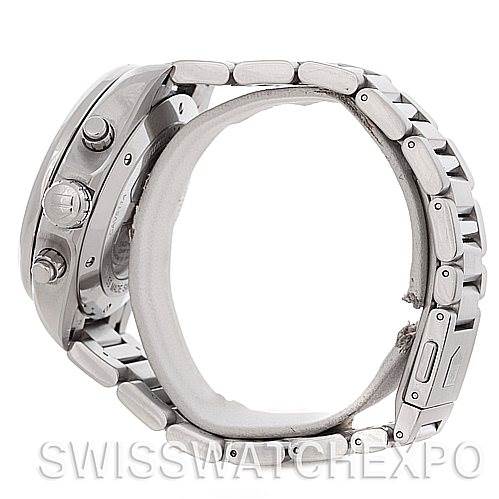 The image shows a side view of a Tag Heuer Carrera CAV511A.BA0902 Men's Stainless Steel Black Dial CAV511A.BA0902 Men's Stainless Steel Black Dial watch, highlighting the case, crown, pushers, and metal bracelet.