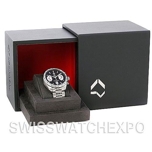 The image shows a Tag Heuer Carrera CAV511A.BA0902 Men's Stainless Steel Black Dial CAV511A.BA0902 Men's Stainless Steel Black Dial watch in its box, photographed at an angle displaying the watch face and part of the bracelet.