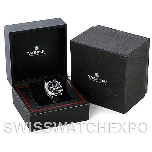 The image shows the Tag Heuer Monza CR2113-0 Stainless Steel Black Dial CR2113-0 Stainless Steel Black Dial watch at a front angle, placed inside an open box, with another closed box beside it.