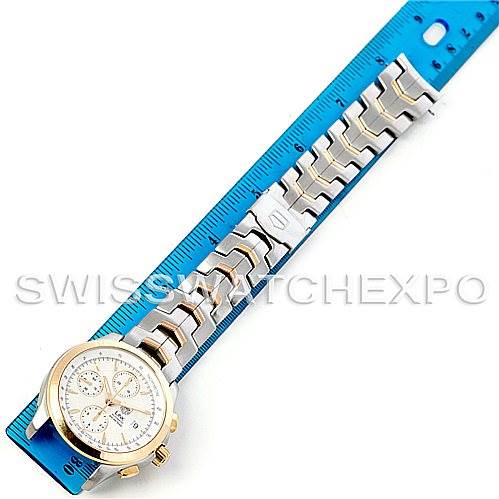 The Tag Heuer Link CJF2150 Men's Steel and Gold (two tone) Silver Dial CJF2150 Men's Steel and Gold (two tone) Silver Dial model watch is displayed flat with its linked bracelet aligned next to a ruler for measurement.