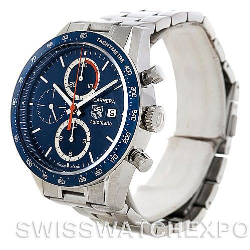 The image shows a Tag Heuer Carrera CV2015 Men's Stainless Steel Blue Dial CV2015 Men's Stainless Steel Blue Dial watch at an angle displaying its blue dial, chronograph subdials, date window, and stainless steel bracelet.