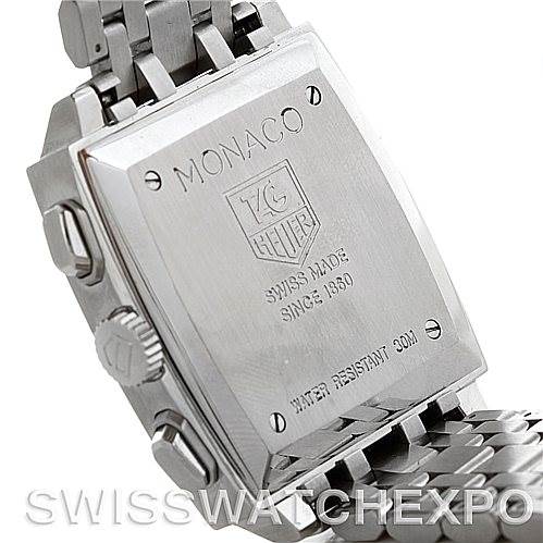 The image shows the back case and part of the metal bracelet of the Tag Heuer Monaco CW2111.BA078 Men's Stainless Steel Black Dial CW2111.BA078 Men's Stainless Steel Black Dial watch.