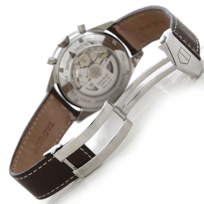 This image shows the back view of a Tag Heuer Carrera CV2013 Men's Stainless Steel Brown Dial CV2013 Men's Stainless Steel Brown Dial watch, highlighting its movement and leather strap with clasp.