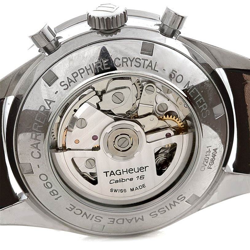 The image shows the back view of a Tag Heuer Carrera CV2013 Men's Stainless Steel Brown Dial CV2013 Men's Stainless Steel Brown Dial watch displaying its internal mechanism and engravings.