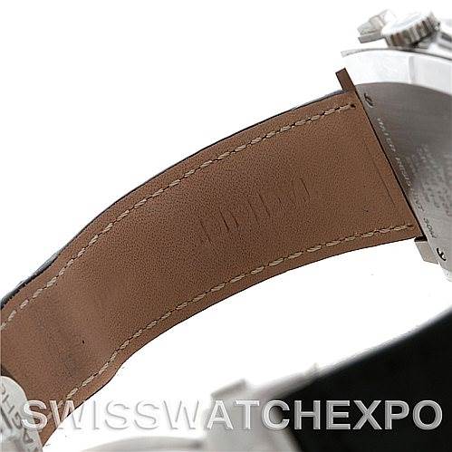 The image shows the back side of a leather strap and part of the case of a Tag Heuer Monaco CW2111 Men's Stainless Steel Black Dial CW2111 Men's Stainless Steel Black Dial watch.