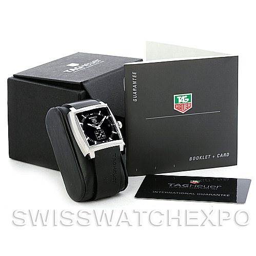 The image shows a Tag Heuer Monaco WW2110 Men
s Black Dial WW2110 Men
s Black Dial watch at an angle highlighting the front, with accompanying box, booklet, and guarantee card displayed.