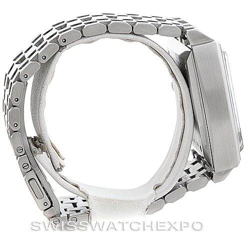 The image shows a side view of the Tag Heuer Monaco CW2111 Men's Stainless Steel Black Dial CW2111 Men's Stainless Steel Black Dial watch, highlighting its case and metal bracelet.