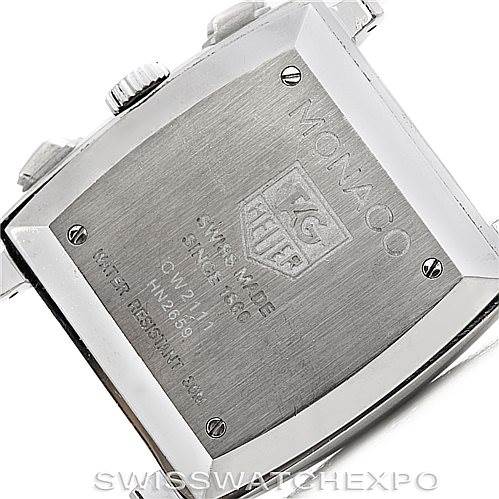 The image shows the back case of a Tag Heuer Monaco CW2111 Men's Stainless Steel Black Dial CW2111 Men's Stainless Steel Black Dial watch, featuring the brand's logo and model details.