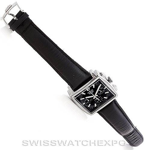 The image shows a Tag Heuer Monaco CS2111 Men's Stainless Steel Black Dial CS2111 Men's Stainless Steel Black Dial watch laid flat, displaying the face, strap, and buckle from a top-down angle.
