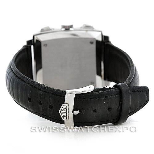 The image shows the back of a Tag Heuer Monaco CS2111 Men's Stainless Steel Black Dial CS2111 Men's Stainless Steel Black Dial watch, focusing on the leather strap and the clasp.