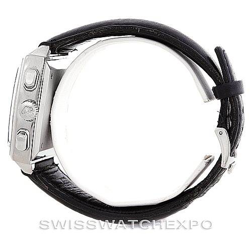 The image shows a side view of the Tag Heuer Monaco CS2111 Men's Stainless Steel Black Dial CS2111 Men's Stainless Steel Black Dial watch, highlighting the crown, pushers, and a black leather strap.