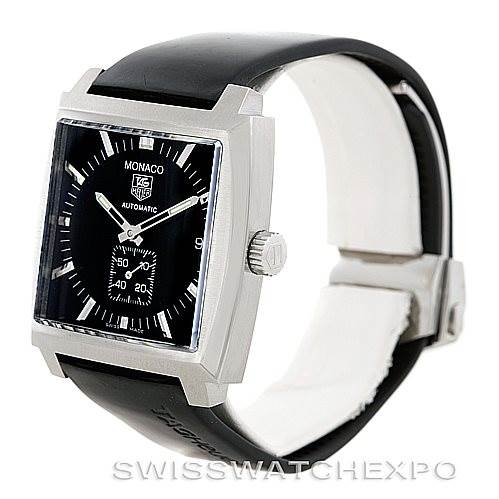 The image shows a Tag Heuer Monaco WW2110 Men
s Stainless Steel Black Dial WW2110 Men
s Stainless Steel Black Dial watch at a three-quarter angle, displaying the face, crown, and part of the strap.
