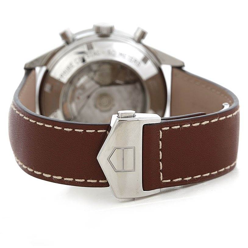 The image shows the back of a Tag Heuer Carrera CV2013 Men's Stainless Steel Brown Dial CV2013 Men's Stainless Steel Brown Dial watch with a close-up on the brown leather strap and clasp.