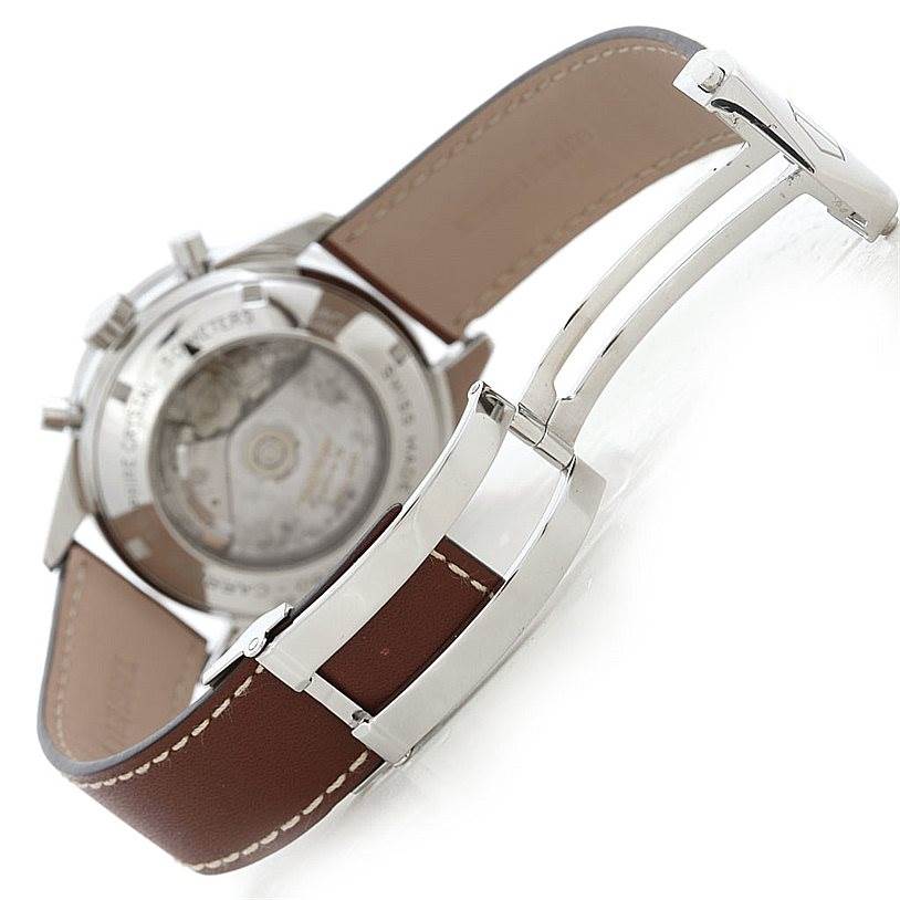 The image shows the back view of the Tag Heuer Carrera CV2013 Men's Stainless Steel Brown Dial CV2013 Men's Stainless Steel Brown Dial watch, highlighting the movement, leather strap, and clasp.