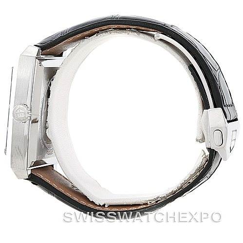 The image shows a side view of the Tag Heuer Monaco WW2110 Men's Stainless Steel Black Dial WW2110 Men's Stainless Steel Black Dial watch, highlighting its case and leather strap with a deployment clasp.