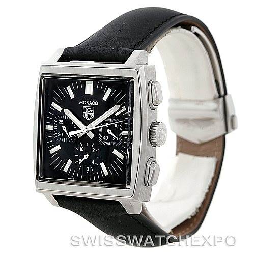 The image shows a Tag Heuer Monaco CW2111 Men
s Stainless Steel Black Dial CW2111 Men
s Stainless Steel Black Dial watch from an angled side view, highlighting its square face, two pushers, and crown.