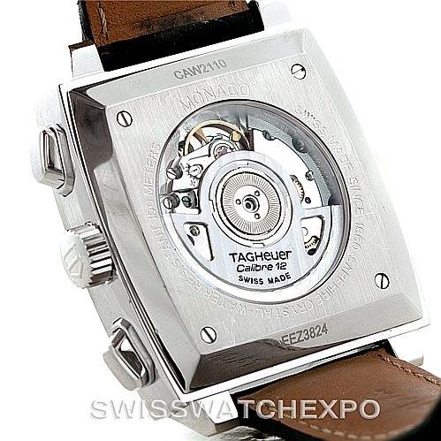 The image shows the back view of a Tag Heuer Monaco CAW2110 Men's Stainless Steel Black Dial CAW2110 Men's Stainless Steel Black Dial watch, revealing its Calibre 12 movement and the inner mechanism.