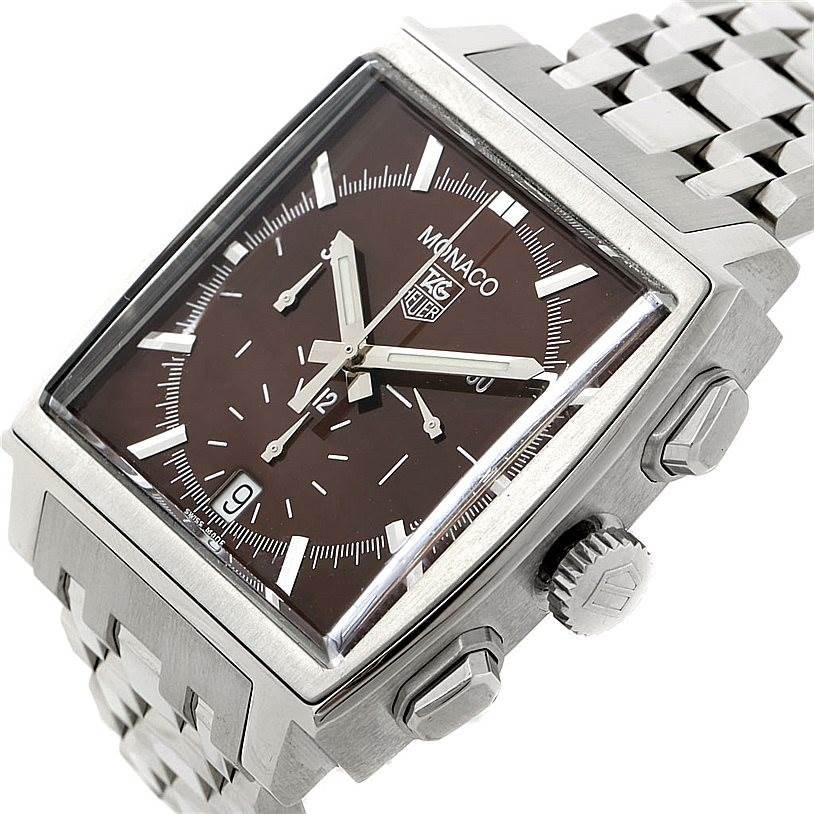 The Tag Heuer Monaco CW2114 Men's Stainless Steel Brown Dial CW2114 Men's Stainless Steel Brown Dial watch is shown at an angle displaying the dial, crown, push buttons, and part of the metal bracelet.