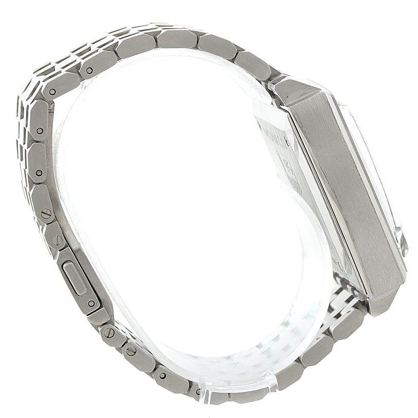 The image shows a side view of the Tag Heuer Monaco CW2114 Men's Stainless Steel Brown Dial CW2114 Men's Stainless Steel Brown Dial watch, highlighting the stainless steel bracelet and case profile.