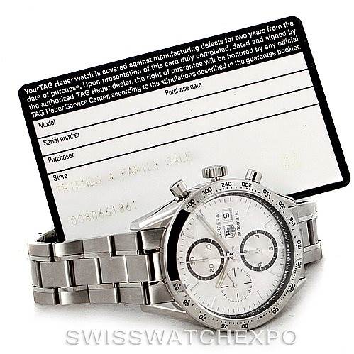The image shows a Tag Heuer Carrera CV2017 Men's Stainless Steel Silver Dial CV2017 Men's Stainless Steel Silver Dial watch at a slightly tilted angle, accompanied by its warranty card.