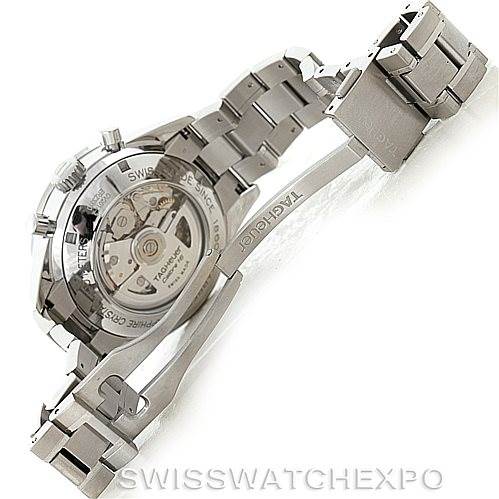 The image shows the backside and clasp of a Tag Heuer Carrera CV2017 Men's Stainless Steel Silver Dial CV2017 Men's Stainless Steel Silver Dial watch, highlighting the movement mechanism and stainless steel bracelet.