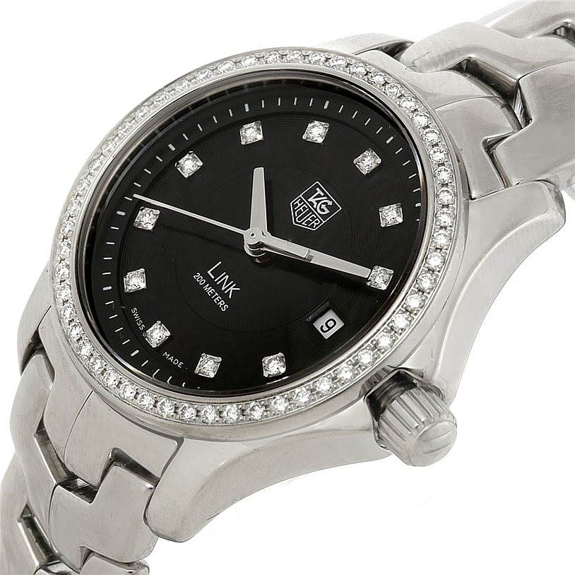 The image shows a close-up angle of the dial, crown, and part of the bracelet of a Tag Heuer Link WJF131A Women's Stainless Steel Black Dial WJF131A Women's Stainless Steel Black Dial watch.